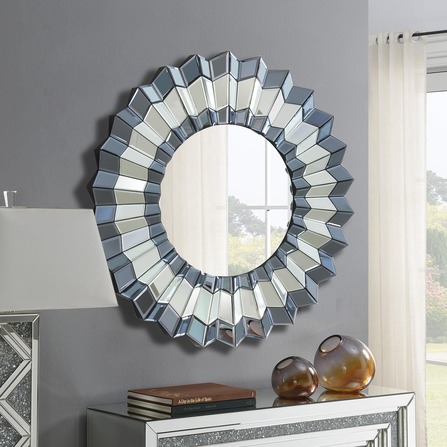 Decorative Round Wall Mirror with Geometric Design and Silver Accents